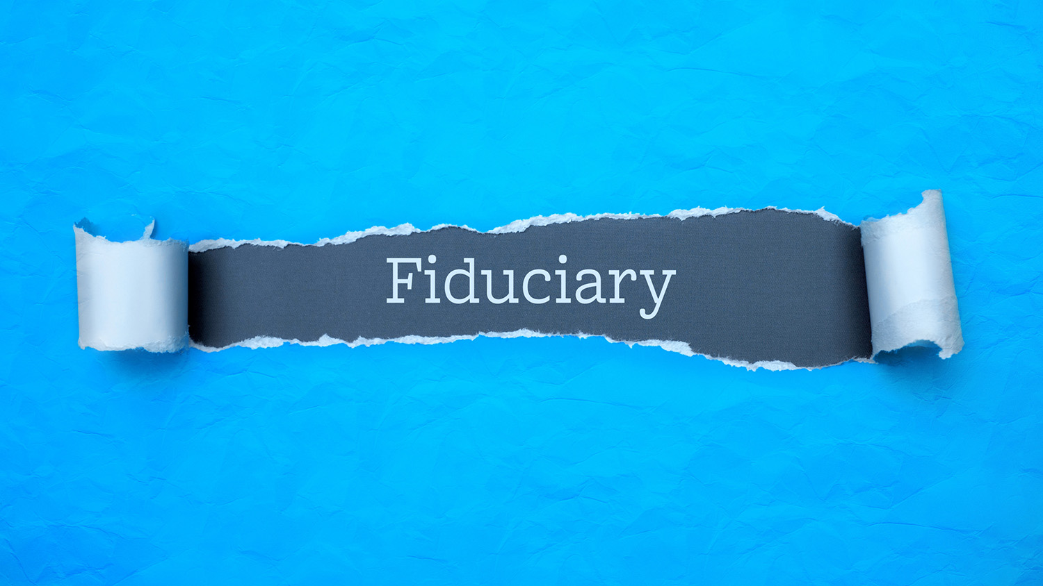 Fiduciary behind ripped paper